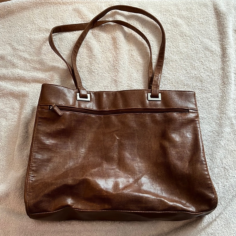 Coldwater Creek brown “snakeskin” tote.  Lots of compartments. Nice condition.